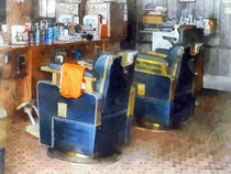 Barber Chair With Orange Barber Cape by Susan Savad