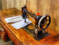 Sewing Machine With Orange Thread by Susan Savad