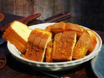 Plate With Sliced Bread and Knives by Susan Savad