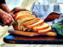 Grandma Slicing Bread by Susan Savad