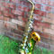 Sig2-saxophoneagainstbrick