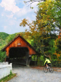 Bicyclist at Middle Bridge Woodstock VT by Susan Savad
