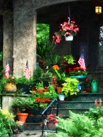 Porch With Geraniums and American Flags by Susan Savad
