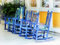 Row of Blue Rocking Chairs by Susan Savad