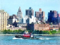 Manhattan NY - Tugboat Against Manhattan Skyline by Susan Savad