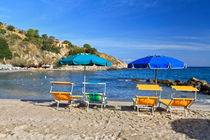 beach chairs and umbrellas by Antonio Scarpi