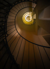 Spiral staircase in brown and yellow tones by Jarek Blaminsky