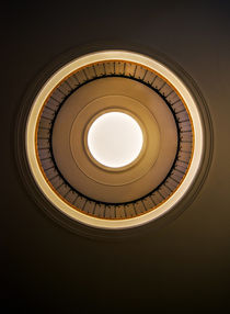 Round staircase in brown tones by Jarek Blaminsky