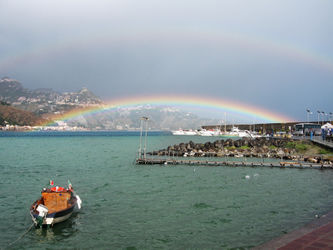 Double-rainbow-over-the-sea-sicily-italy