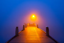 Jetty on a foggy morning at dawn by Sara Winter
