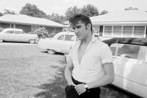 Elvis Presley with his Cadillacs by Phillip Harrington