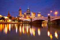 Skyline of Melbourne, Australia across the Yarra River at night by Sara Winter