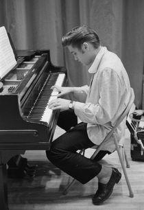Elvis Presley on piano 1956 by Phillip Harrington