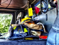 Two Firefighter's Helmets Inside Fire Truck by Susan Savad