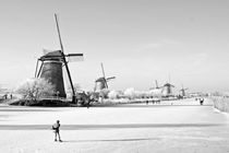 Traditional winter scenery at Kinderdijk in the Netherlands by nilaya