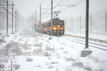 Train driving in heavy snow in the Netherlands by nilaya