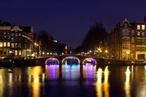 Amsterdam at the Amstel by night in the Netherlands by nilaya
