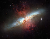 Starburst galaxy, Messier 82 by Stocktrek Images
