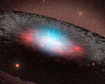 Supermassive black hole at the center of a galaxy by Stocktrek Images