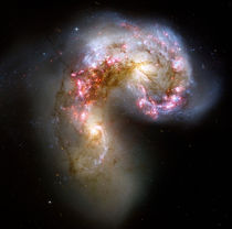 The Antennae galaxies. by Stocktrek Images