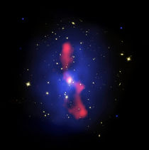 Composite image of a galaxy cluster. by Stocktrek Images