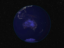 Earth at night centered on Australia and Oceania. by Stocktrek Images