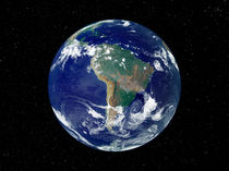 Fully lit Earth centered on South America. by Stocktrek Images