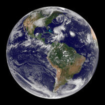 View of the full Earth and four storm systems. by Stocktrek Images