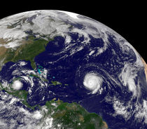 Tropical cyclones in the Atlantic Ocean basin. by Stocktrek Images