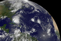Hurricane Irene moving through the Bahamas. by Stocktrek Images
