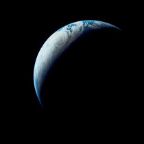 Crescent Earth taken from the Apollo 4 mission. by Stocktrek Images