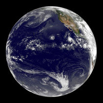 Earth showing tropical cyclones in the Pacific. by Stocktrek Images