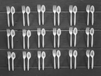 spoons and forks on the table in black and white von timla
