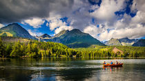 Floating boats on the Strbske Pleso lake by Zoltan Duray