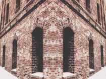 old brown brick building with windows von timla