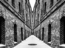 old brick buildings in black and white by timla