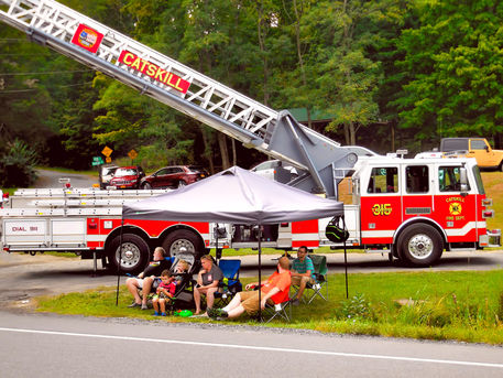 Fire-truck-with-ladder-extended-on-display-1