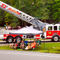 Fire-truck-with-ladder-extended-on-display-1