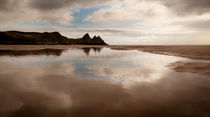 Reflections of Three Cliffs Bay by Leighton Collins