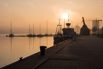 Sonnenaufgang im Stadthafen von Rostock by Rico Ködder