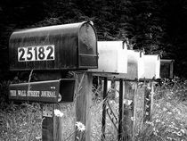 Black and white row of old road country mailboxes by Sharon Yanai