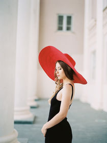 woman walking with a hat by Mihas' Koneckiy