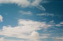 A plane crossing the sky von Alexey Moskvin