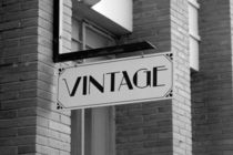 Vintage sign on a house by stephiii