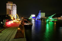 Colorful illuminated container terminal in Stuttgart by night von stephiii