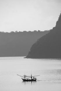 thai fisherboat and steep islands by anando arnold