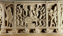 Relief depicting seated Buddha preaching surrounded by worshippers by Indian School