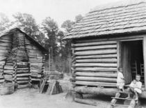Log cabins in Thomasville, Florida, c.1900 by American Photographer
