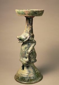 Early Chinese pottery lamp by Han Dynasty Chinese School