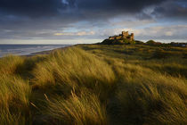 Bamburgh Castle at sunset by chris-drabble